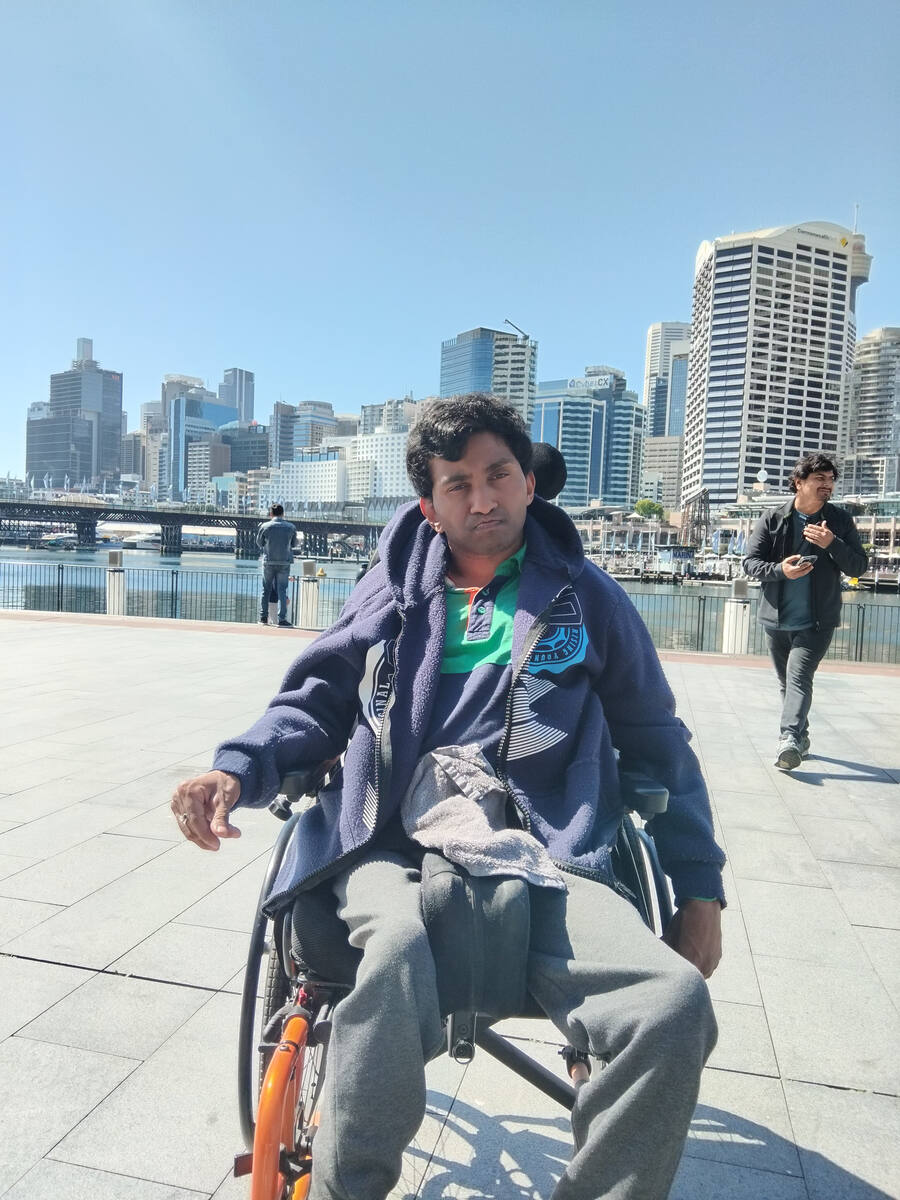 Enable Hub participant enjoying a day out at Darling Harbour