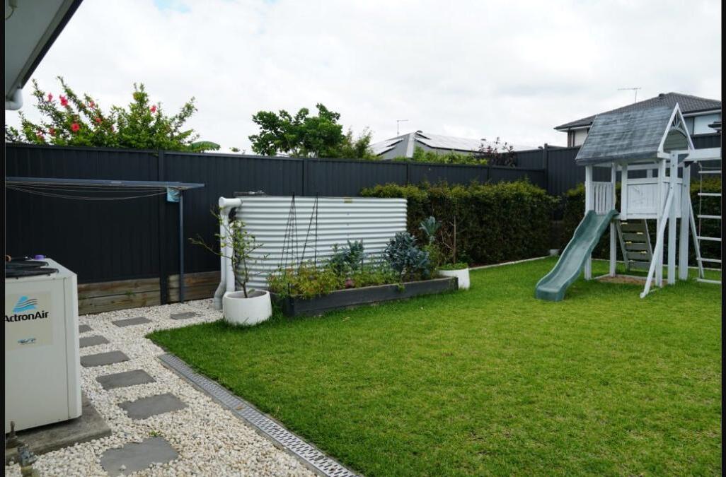 Backyard of the Enable Hub Windsor SIL home vacancy